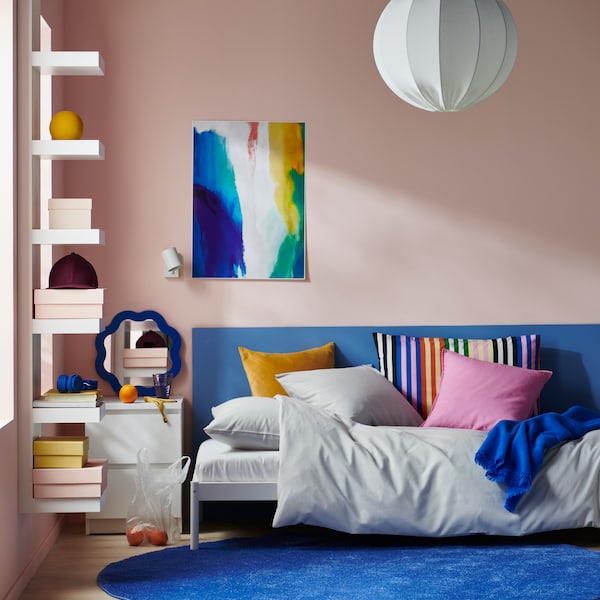 A grey PILTANDVINGE duvet cover and pillowcase